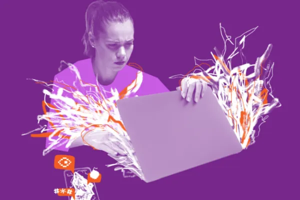 Woman opening a laptop