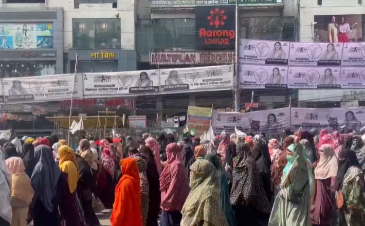 Female supporters of Jamaat e-Islami take part in a march in Dhaka