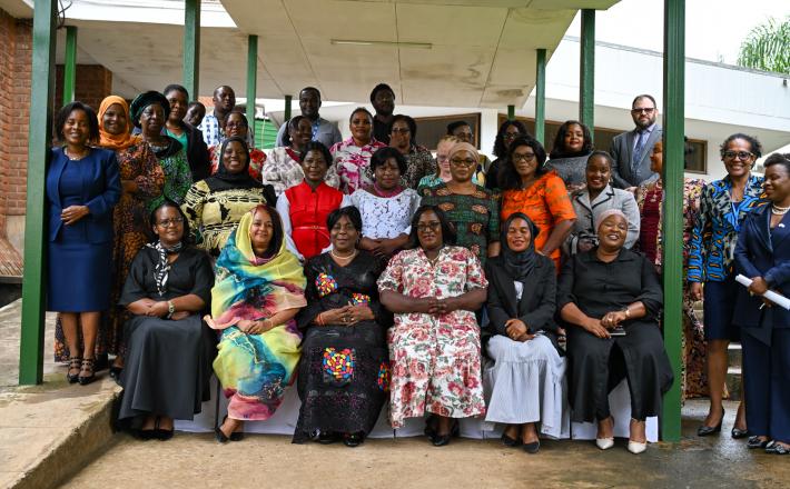 Hon. Mary Maulidi Khembo, MP, Chairperson of the Parliamentary Women’s Caucus (seated, front row, third from right), and Senator Biodun Olujimi (seated, front row, third from left), representing the African Women’s Leadership Network, pose for a group photo with members of the Parliamentary Women’s Caucus.