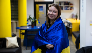 Girl draped in a Ukrainian Flag