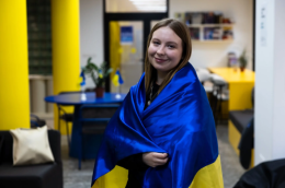 Girl draped in a Ukrainian Flag