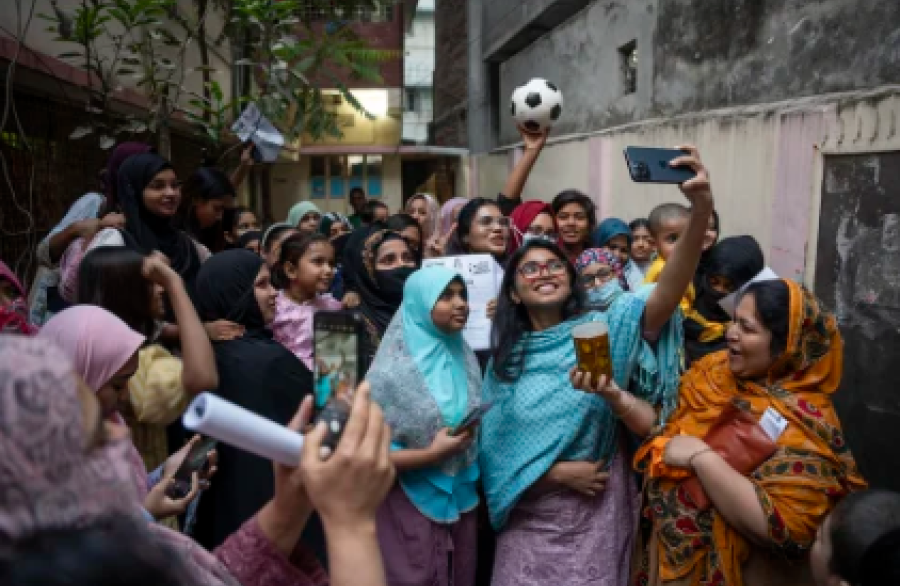 Tasnim Zara, an independent candidate for parliament, takes a selfie with other young women in Dhaka, Bangladesh, February 6, 2026. Suman Kanti Paul/Drik/Getty Images