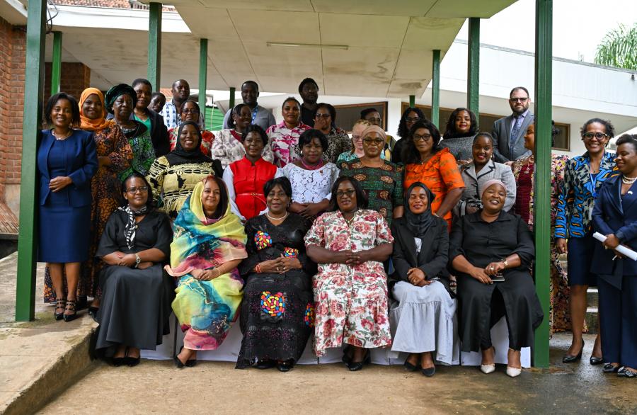 Hon. Mary Maulidi Khembo, MP, Chairperson of the Parliamentary Women’s Caucus (seated, front row, third from right), and Senator Biodun Olujimi (seated, front row, third from left), representing the African Women’s Leadership Network, pose for a group photo with members of the Parliamentary Women’s Caucus.