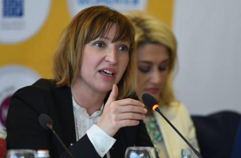 Jeta Xharra, Kosovo Director for the Balkan Investigative Reporting Network, speaks about the role of women in fighting corruption at the fourth annual Week of Women in Kosovo. Credit: Arben Llapashtica (NDI)