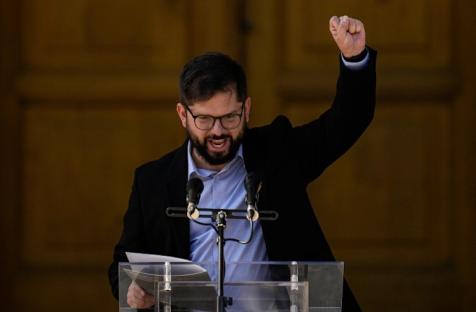 Chilean President-elect Gabriel Boric will be sworn in on March 11 and oversee a vote on a new constitution in the South American nation [Esteban Felix/AP Photo] 