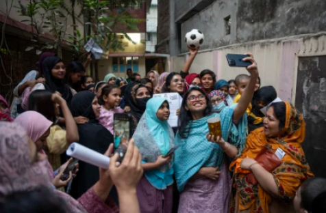 Tasnim Zara, an independent candidate for parliament, takes a selfie with other young women in Dhaka, Bangladesh, February 6, 2026. Suman Kanti Paul/Drik/Getty Images