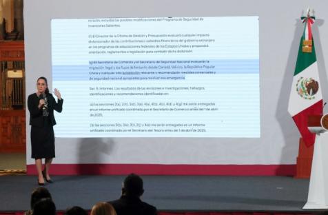 Mexico's President Claudia Sheinbaum speaks about U.S. President Donald Trump's policies during a press conference at the National Palace, in Mexico City, Mexico January 21, 2025. REUTERS/Henry Romero