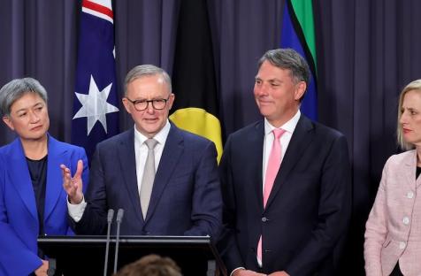 Prime Minister Anthony Albanese is seen here last week, speaking alongside (from left) Finance Minister Penny Wong, Deputy Prime Minster Richard Marles and Finance Minister Katy Gallagher. (David Gray/Getty Images)
