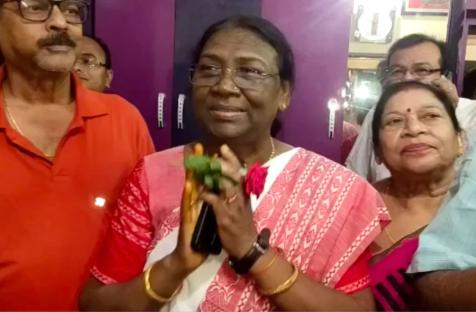 Then-presidential candidate Draupadi Murmu greets supporters in Odisha state, India, on June 22. (AP)