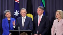 Prime Minister Anthony Albanese is seen here last week, speaking alongside (from left) Finance Minister Penny Wong, Deputy Prime Minster Richard Marles and Finance Minister Katy Gallagher. (David Gray/Getty Images)